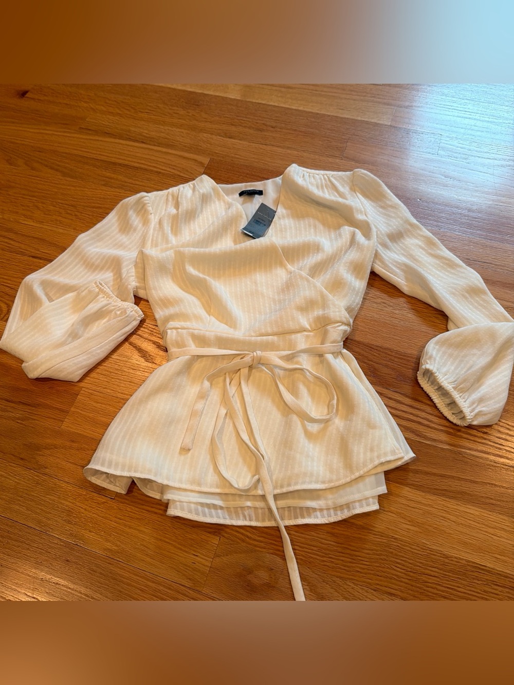 Ann Taylor White wrap style blouse with tie waist and side zipper